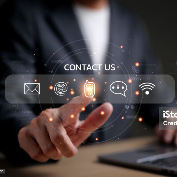 Businessman using a laptop and touching on virtual screen contact icons consists of telephone, email, address, live chat, internet wifi, Contact us or Customer care support hotline people connect.
